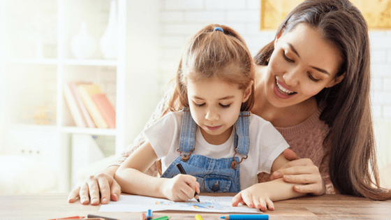 little-girl-coloring-in-with-her-mom